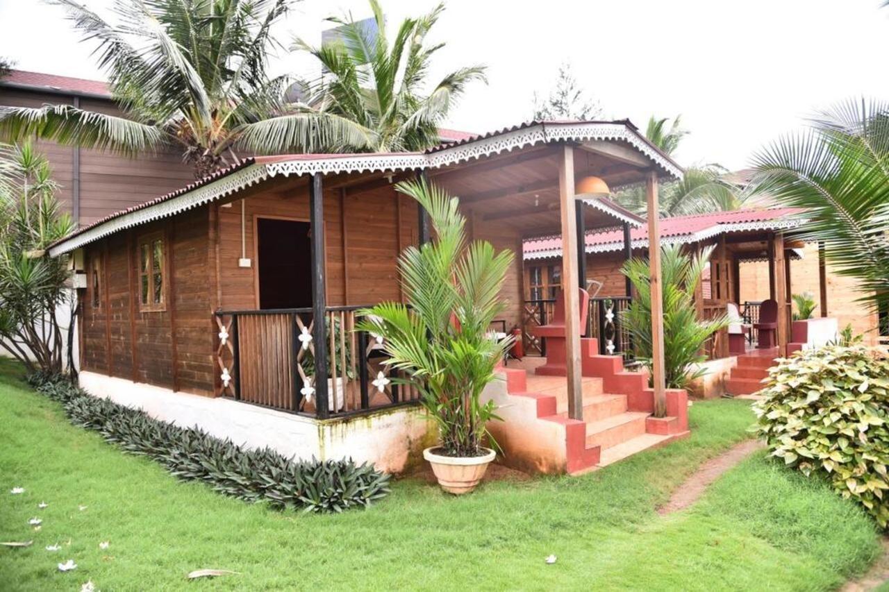 Paes Pearl Beach Villa Baga Exterior photo